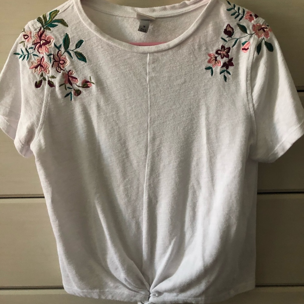 White floral shirt.